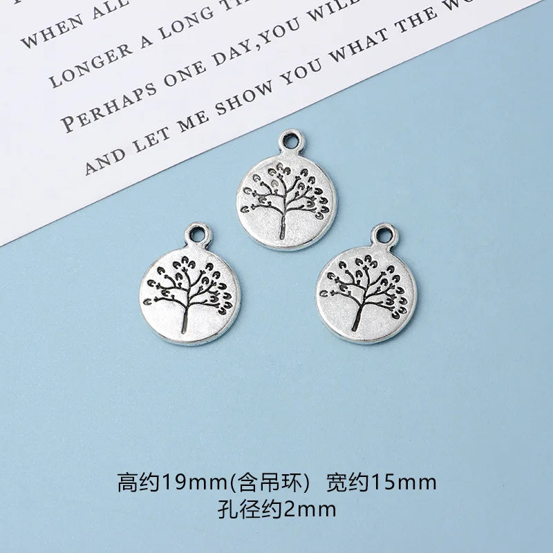 10pcs DIY Vintage Silver Round hollow Tree of Life Pendant Earring Creative Alloy Accessories Material charms for jewelry making